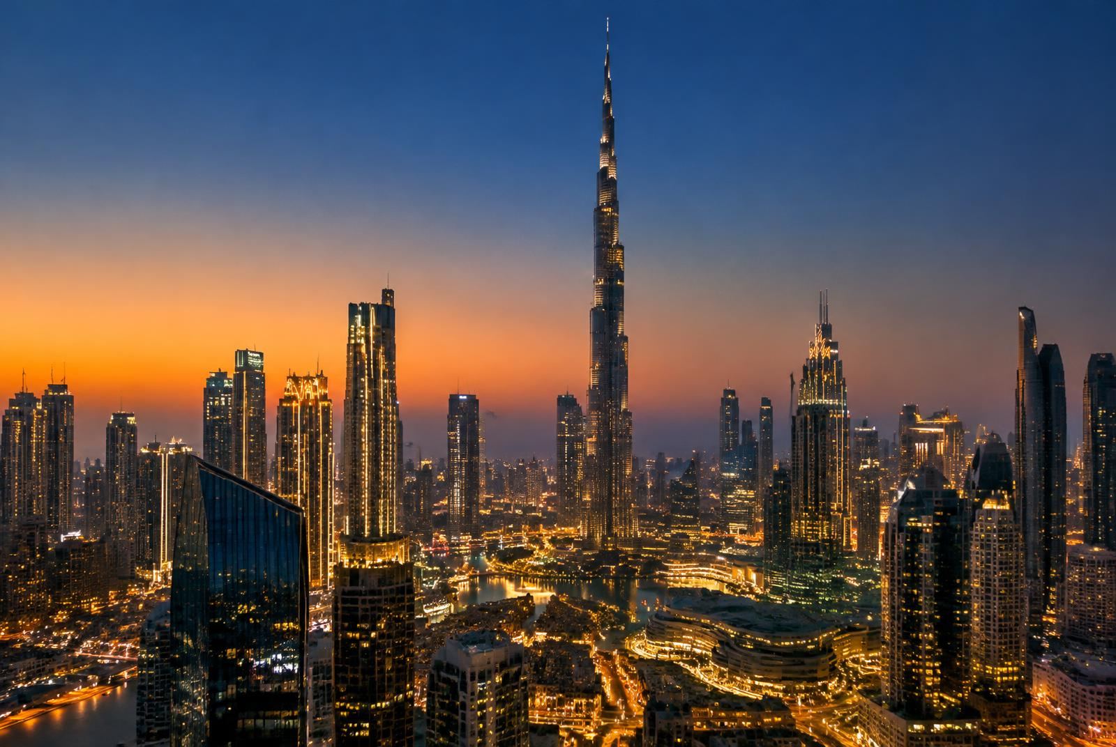 Dubai skyline illuminated at dusk